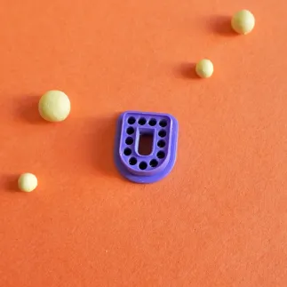 Polymer clay cutter - arc with embossed circles